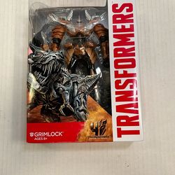 Transformers Age of Extinction Voyager Class Grimlock figure, specifically identifiable as the Takara Tomy AD-03 release