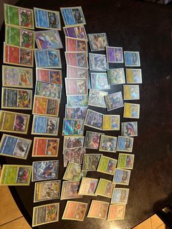 Pokémon cards and some sleeves