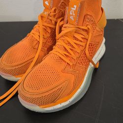 Athletic Propulsion Labs (APL) Concept X basketball shoes in an orange colorway.