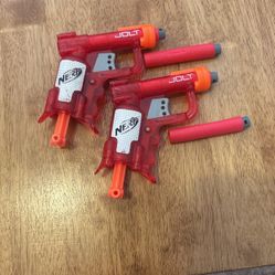Two Small Nerf Guns With 4 Bullets