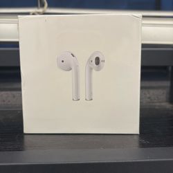 Brand new Apple AirPods with wireless charging case