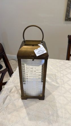 17 and half inches tall candle holder.
