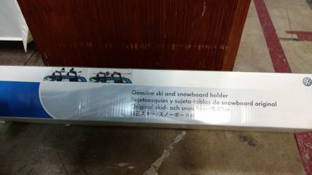 Ski and snowboard holder