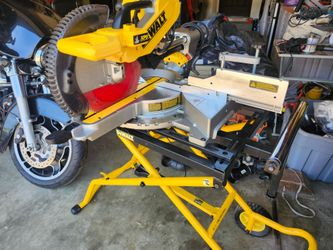 Dewalt twelve inch slider miter compound x p x laser site with scissor stand rollers