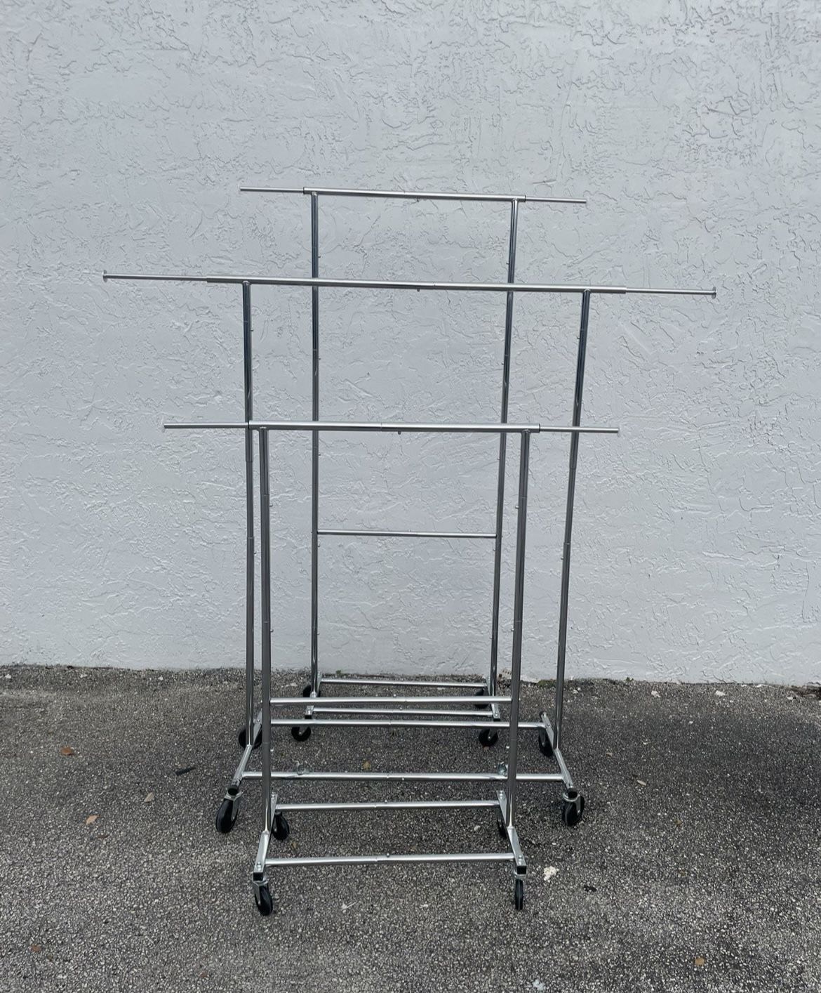 3 Adjustable Rolling Racks.