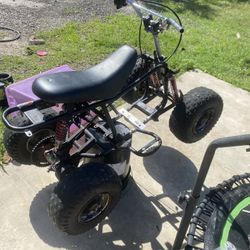 2 motor & 4 wheeler frame package.                                           ( will trade for 1 mini bike frame/roller )