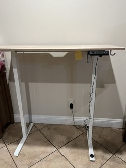 Motionwise Electric Sit Stand Desk Light Brown 48 wd x 24”