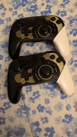 Two Nintendo Switch Pro Controllers