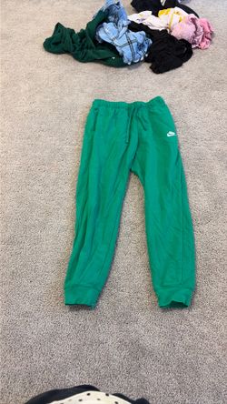 Green Nike sweats