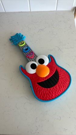Sesame Street rock with Elmo guitar