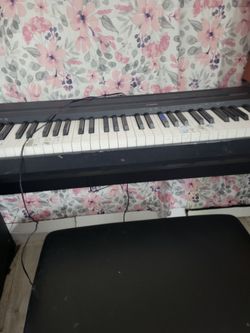 Piano with a seat