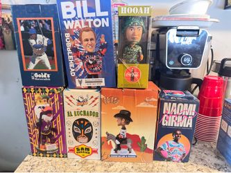 Different mix of  bobble heads. One price for All.