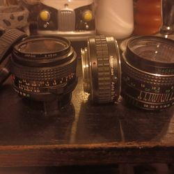 Various 35mm. Camera Lenses  Plus Adapter
