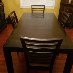Black oak Dining Table And Chairs 