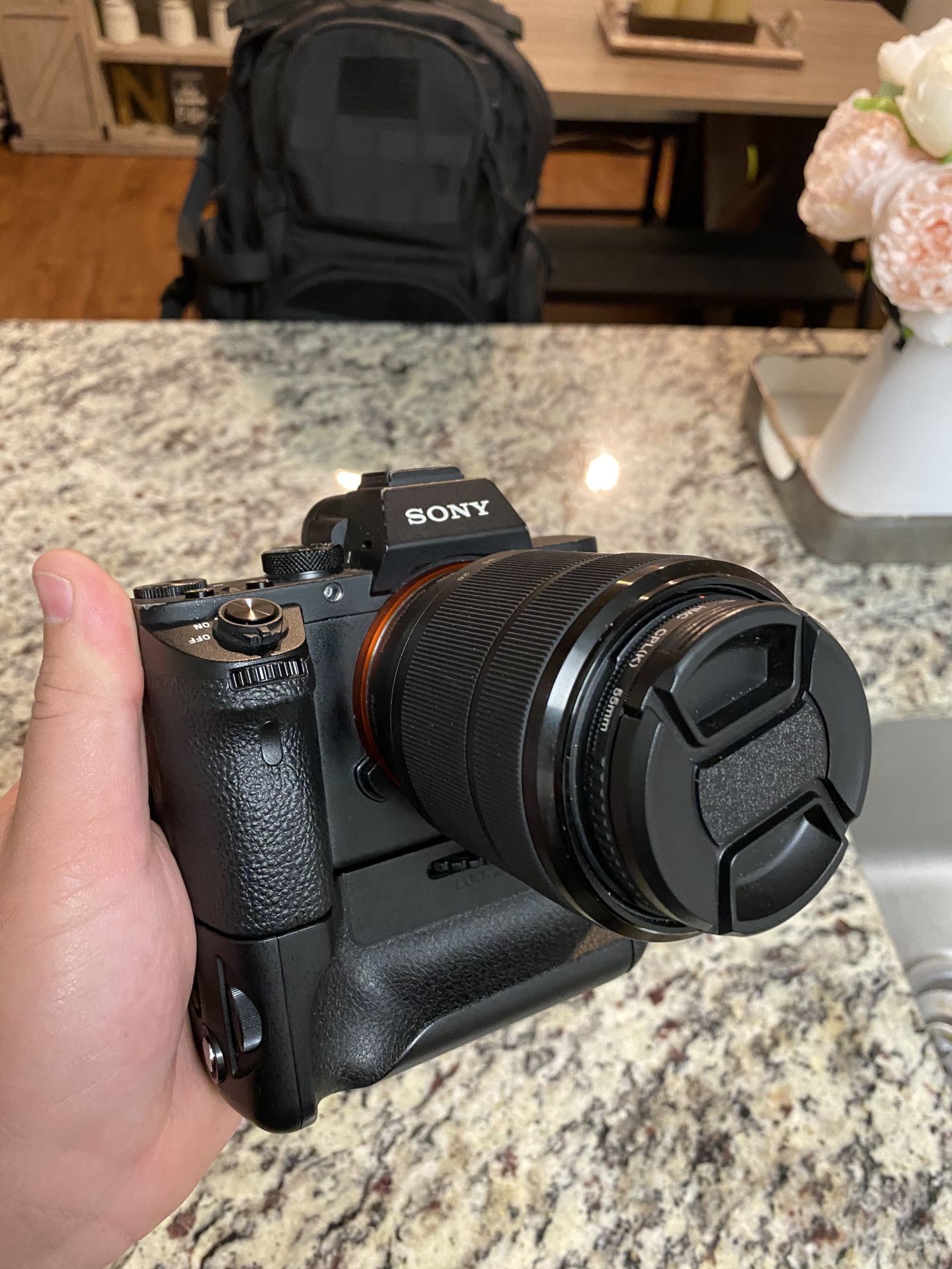 Sony A7ii with 28-70 lens and body grip