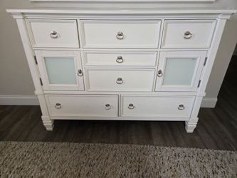 Solid wood Ashley dresser, 2 ikea nightstands and an Queen bed frame