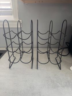 2 black wine holders