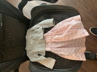 Bin Full Of Baby Blankets, Sheets, And 12 Month Dress