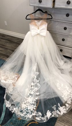Beautiful custom made flower girl dresses with removable train