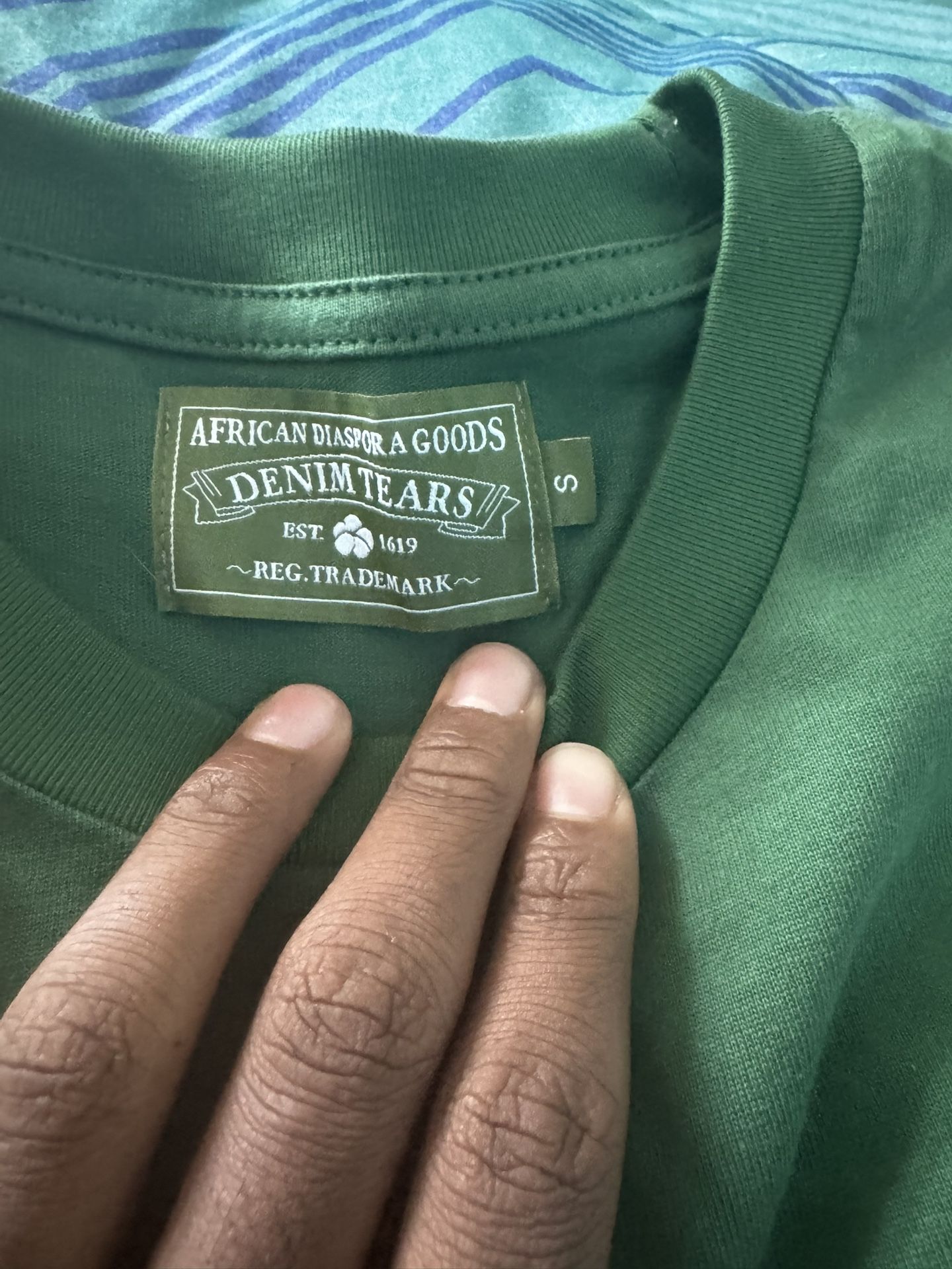 green denim tears shirt