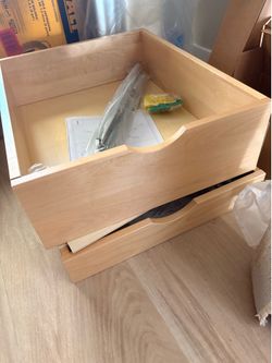 Two 21 (W) x 17 (L) wooden cabinet pull out drawers and hardware.