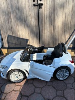 BMW Toddler push car with extendable push rod, music, horn, silent wheels, Excellent condition