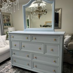 Dresser With Mirror 9 Drawer includes drawer and 2 tables.