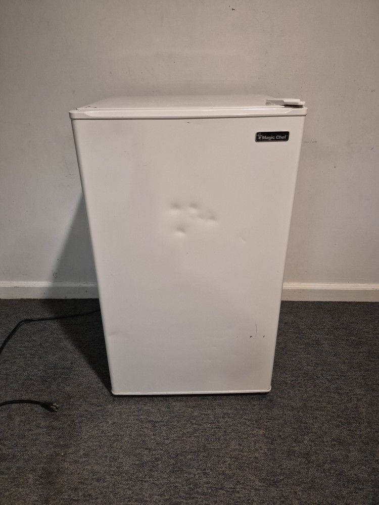 Mini Magic Chef Refrigerator. It's a compact appliance, popular for bedrooms, offices, or small spaces.
