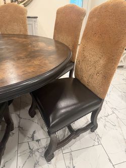 Big Table , beautiful , dining set with 6 leather  chairs, the table measures  71 inches wide  and  H 31 1/2