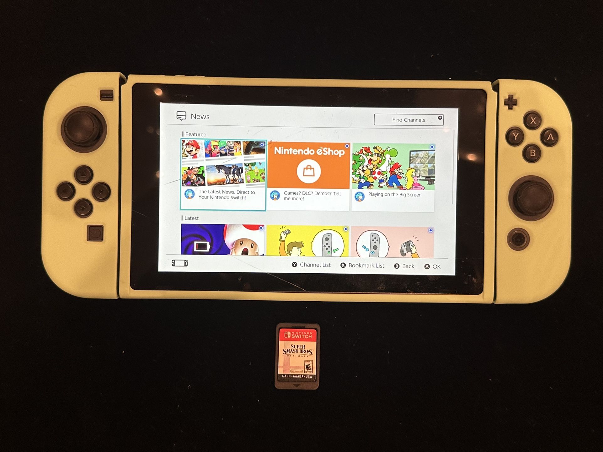 Nintendo Switch 32GB Handheld Console - Green + Super Smash Brothers Game