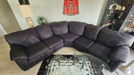 Black curved sectional sofa