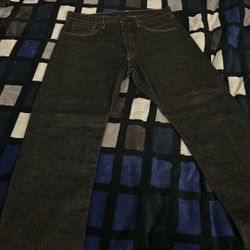 Black 501’s.  Size W 33 L 32