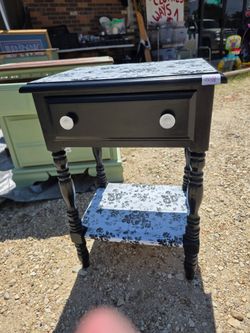 Black and white flower stand