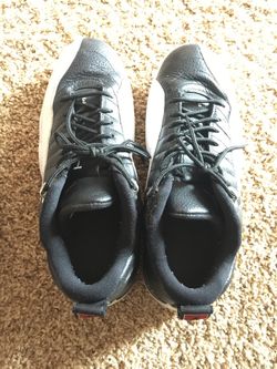 MICHAEL JORDANS SIZE 10. BLACK AND WHITE