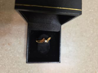 14 k gold diamond ring.  Weight is 1.7 grams