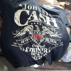 Johnny Cash Man In Black Shirt. M Men. https://offerup.com/redirect/?o=QmxhY2suTWludA== Condition. $15.00 OBO
