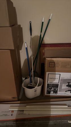 Cleaning supplies sweeper with bin