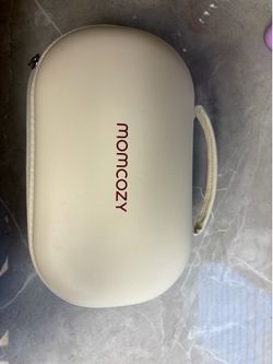 Portable breast pump