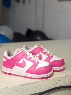 Pink Toddler Nike dunks.