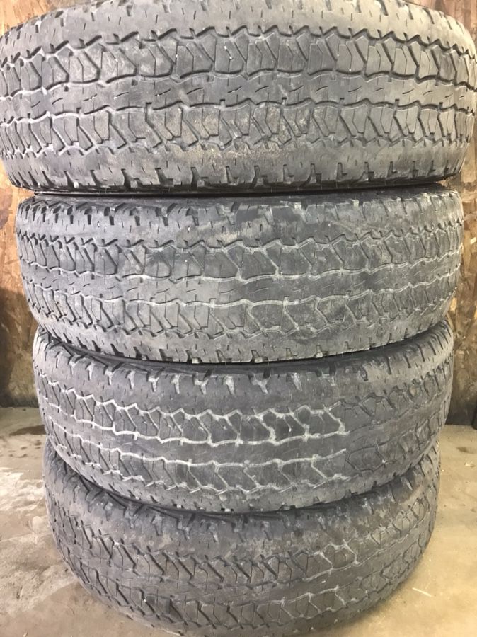 Four 235-75-R17 tires