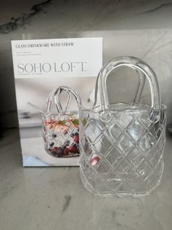 Soho Loft glass purse beverage set with a straw.