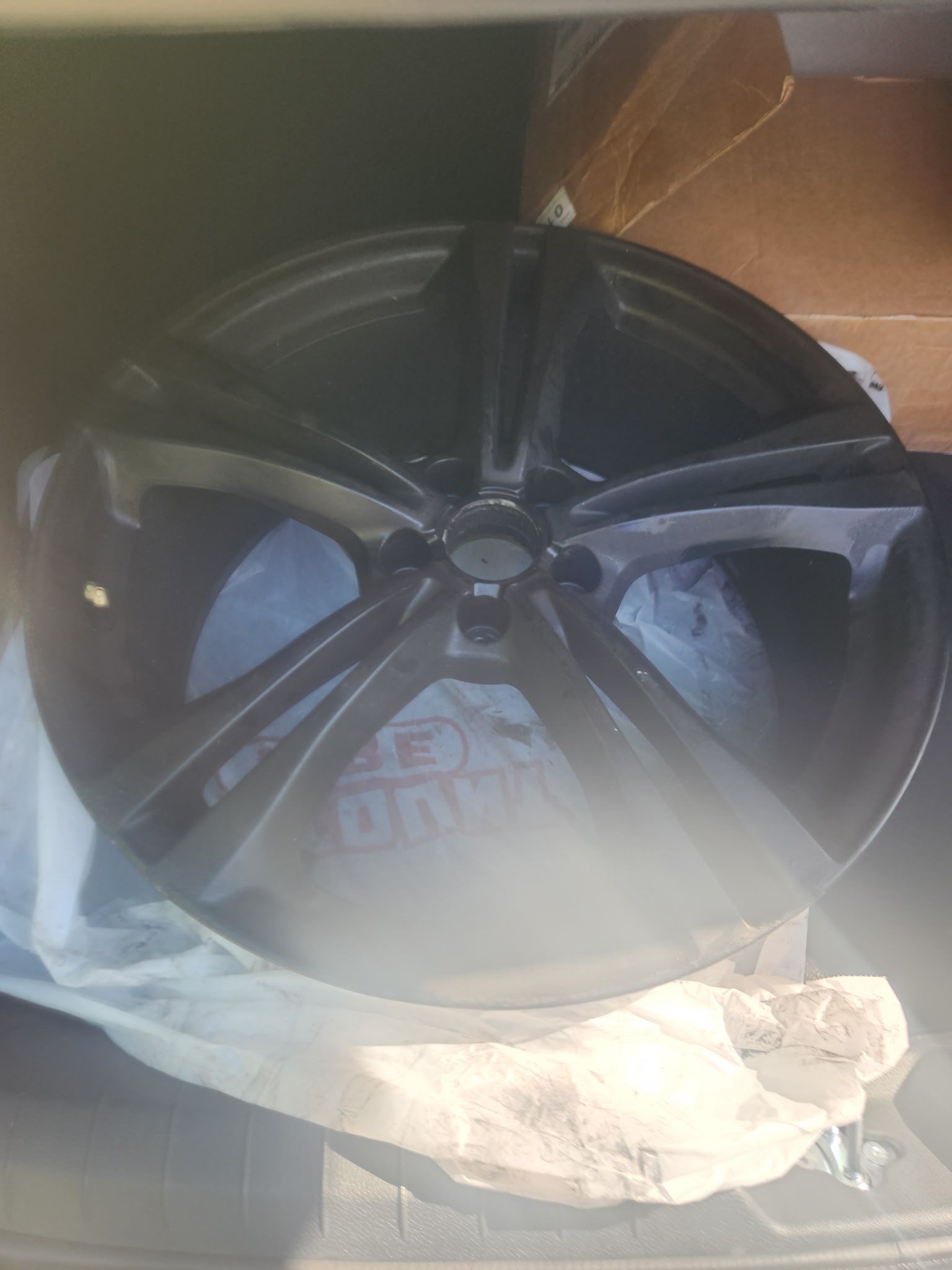 One 20 inch satin black rim