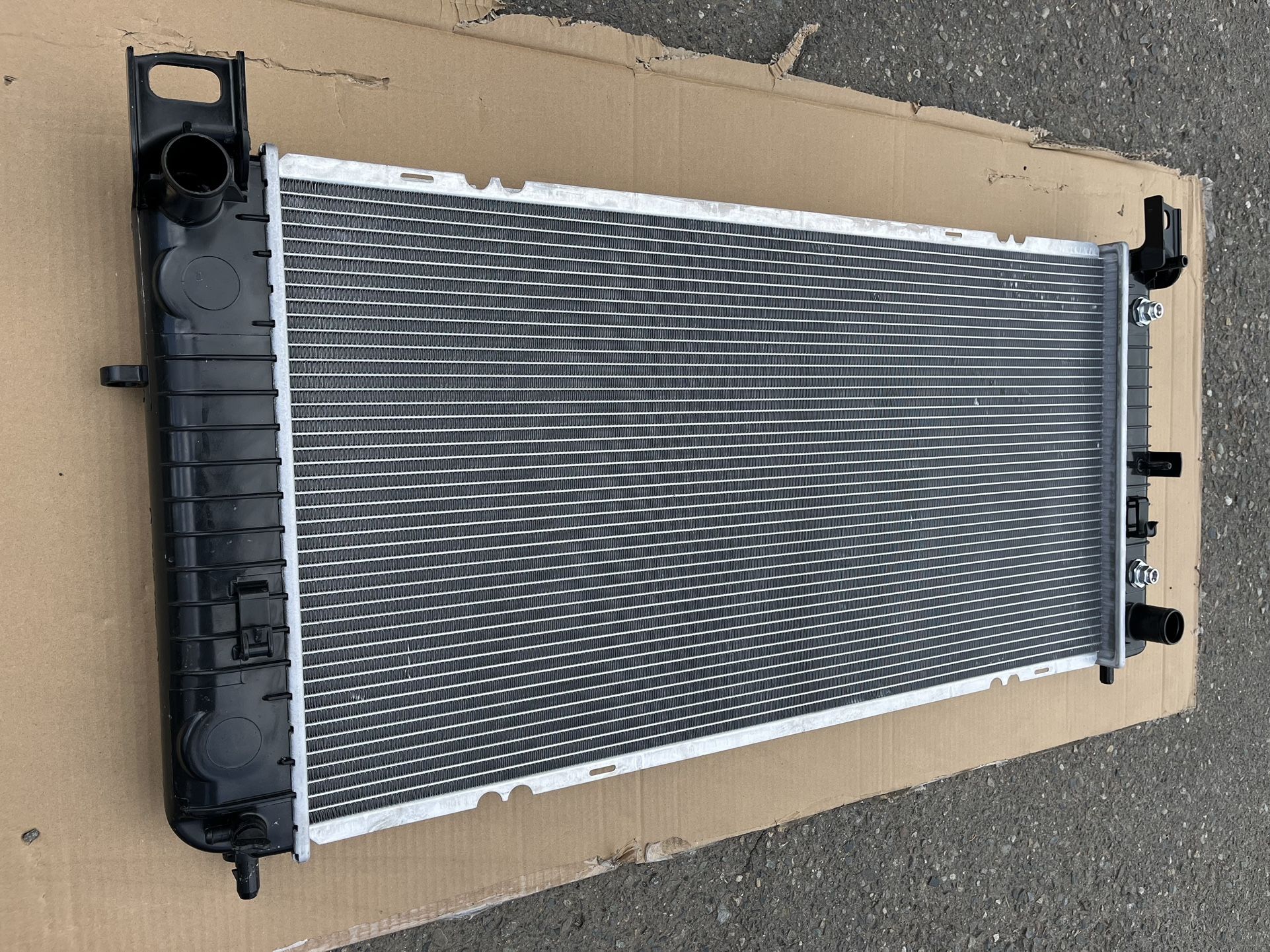 Radiator - 34-1/16" Core Compatible With Chevrolet Silverado, GMC and Cadillac.