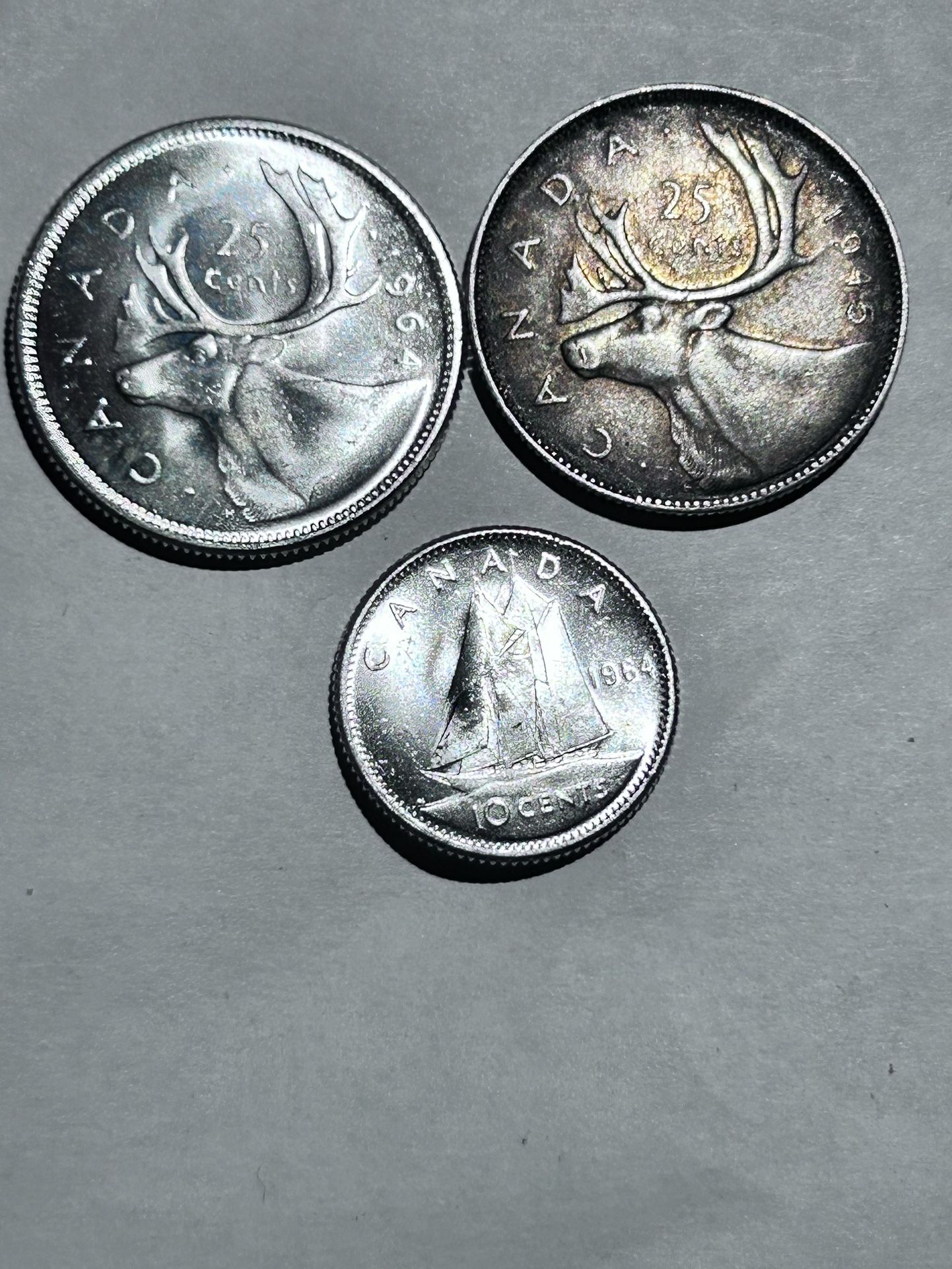 1945/1964 25cent Canada and a 10cent 1964 Canada silver coins in pristine condit