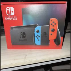 Nintendo Switch With Neon Blue And Neon Red Joy Cons 