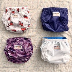 Smart Bottoms cloth diapers with Organic cotton inserts.