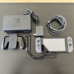 Nintendo Switch w/ Grey Joycons