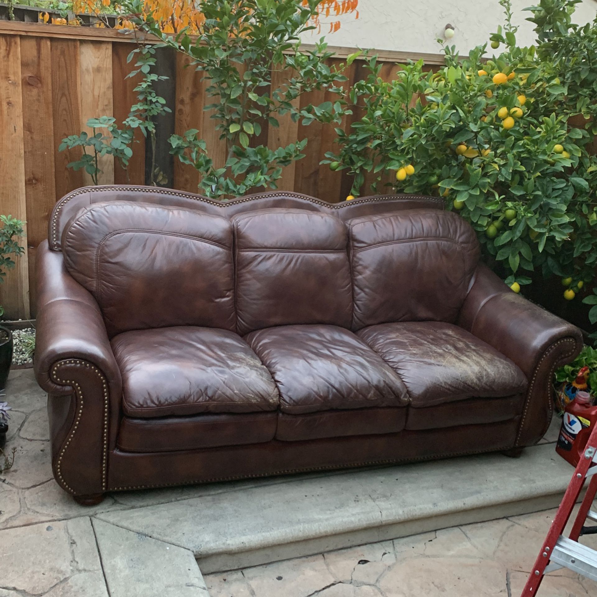 Leather Sofa . Fits 3