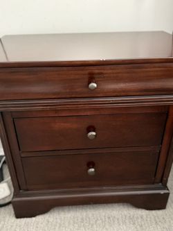Dark wood Three Drawer Nightstand