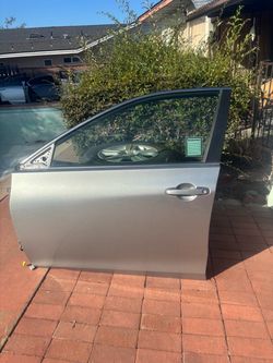 LEFT DRIVER SIDE FRONT DOOR 2017 TOYOTA CAMRY (SILVER) WITH HINGES